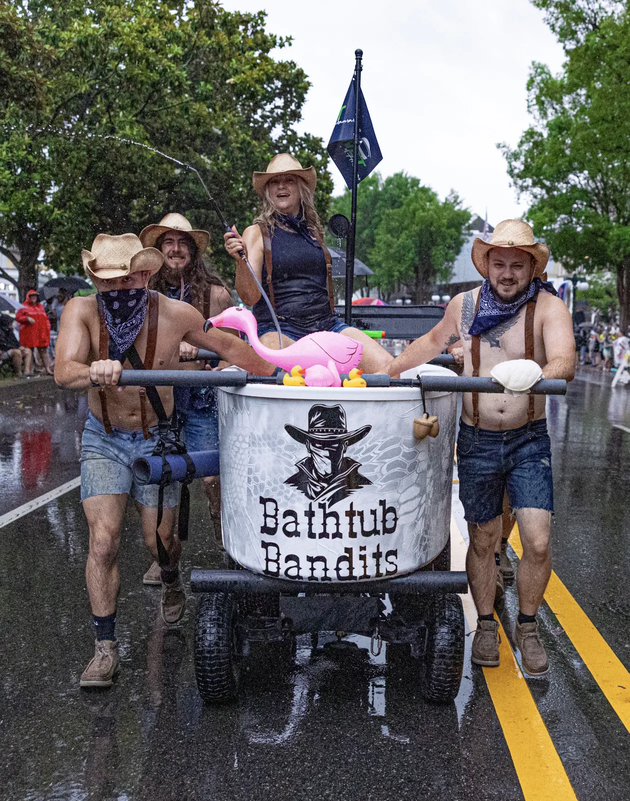 Bathtub Bandits parade float, rainy parade
