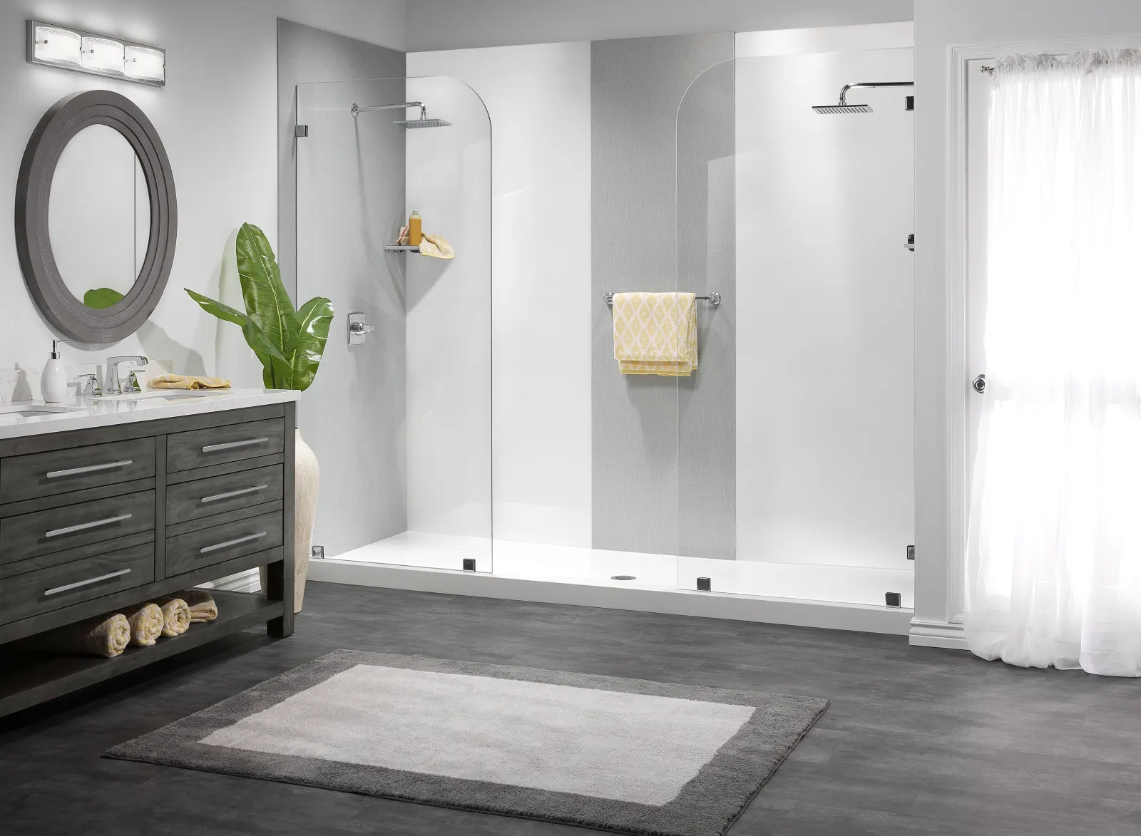 Frameless walk in shower, gray vanity