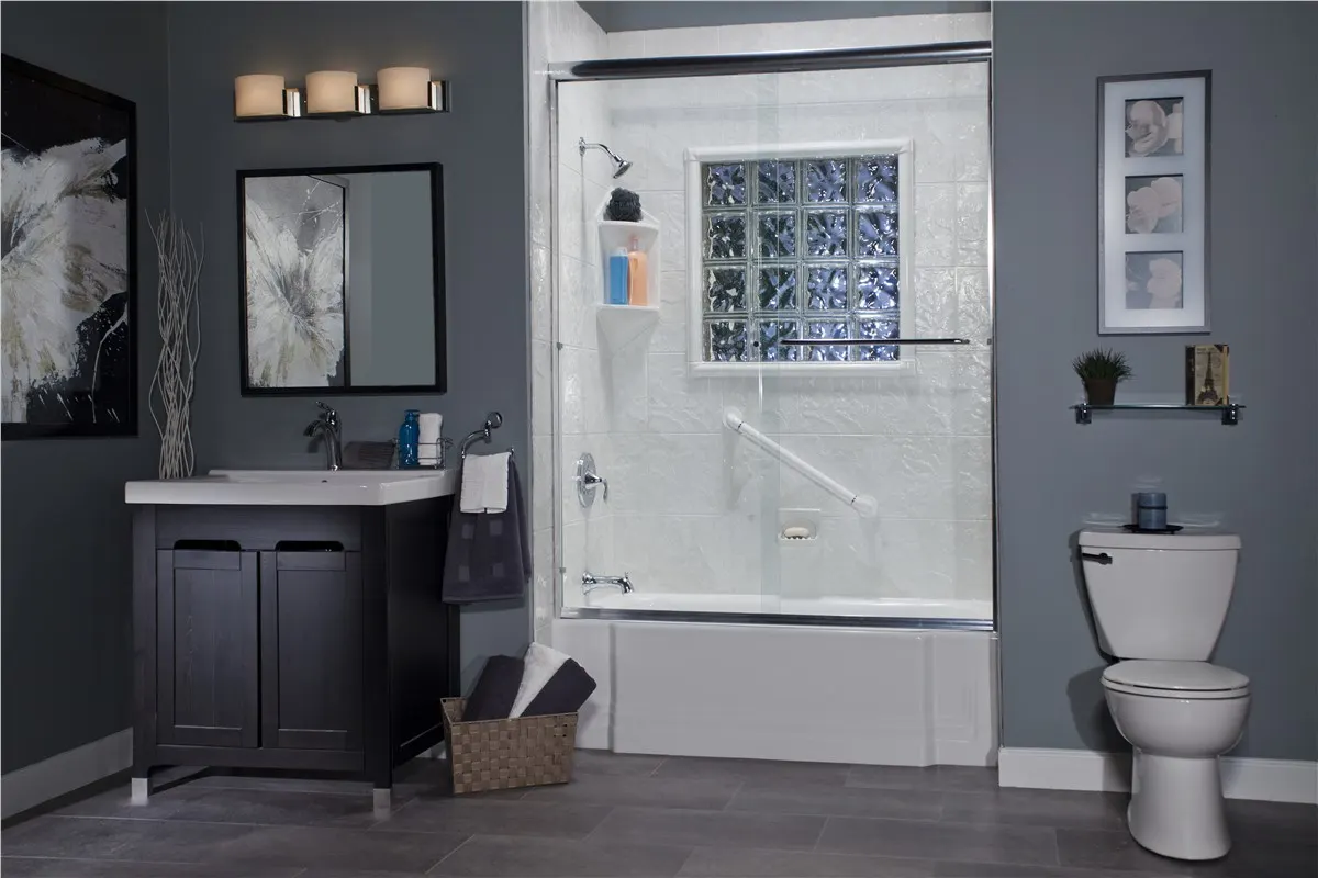 Gray vanity and a shower surround with a block window