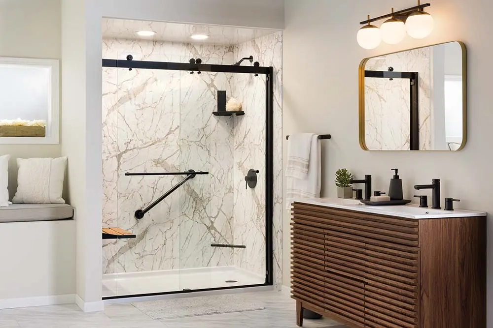 Marble look shower with barn door glass, wood vanity
