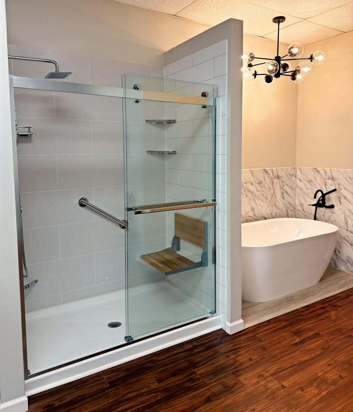 Showroom: glass shower + freestanding tub vignette