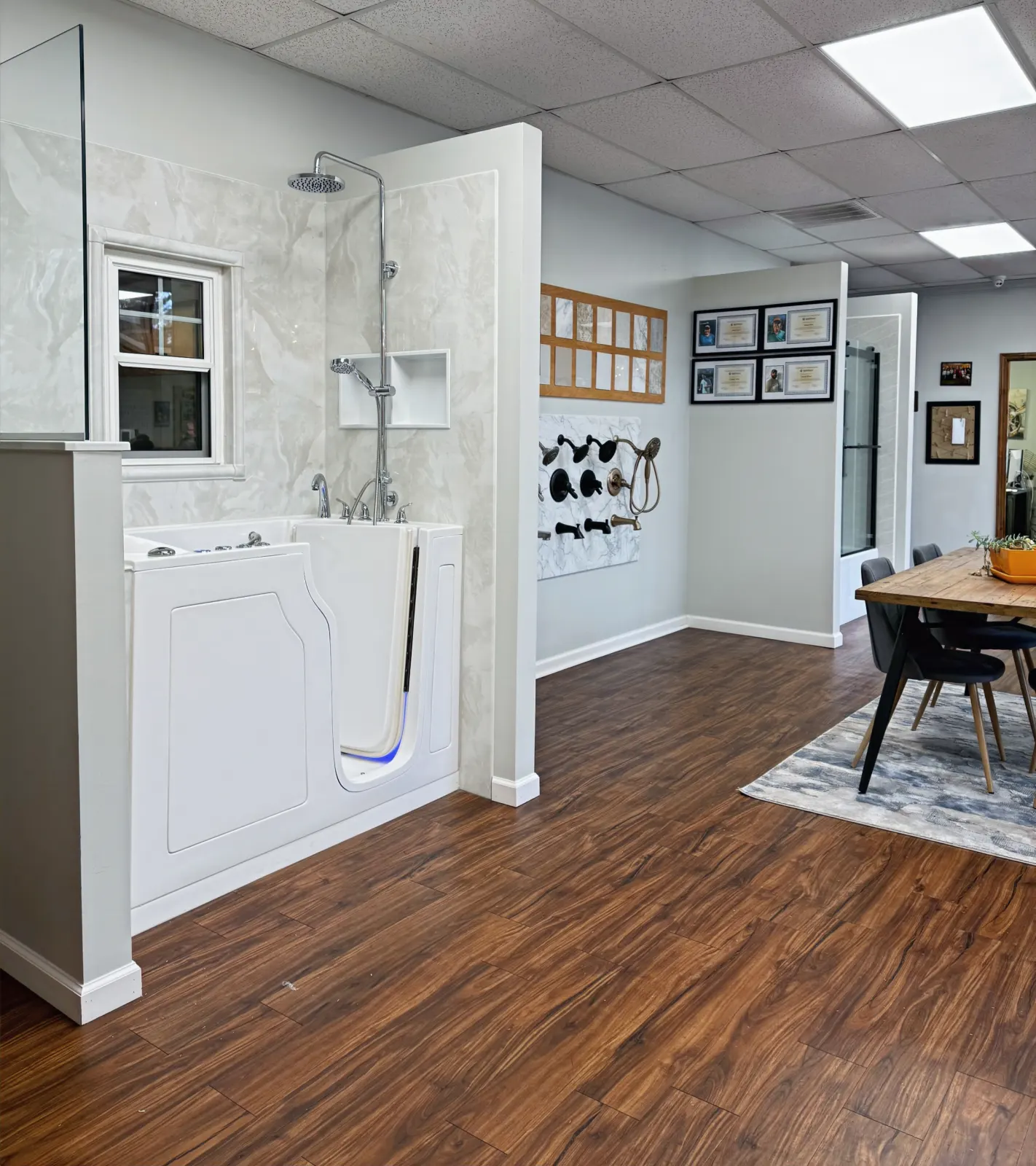 Showroom: walk in tub display, consultation table
