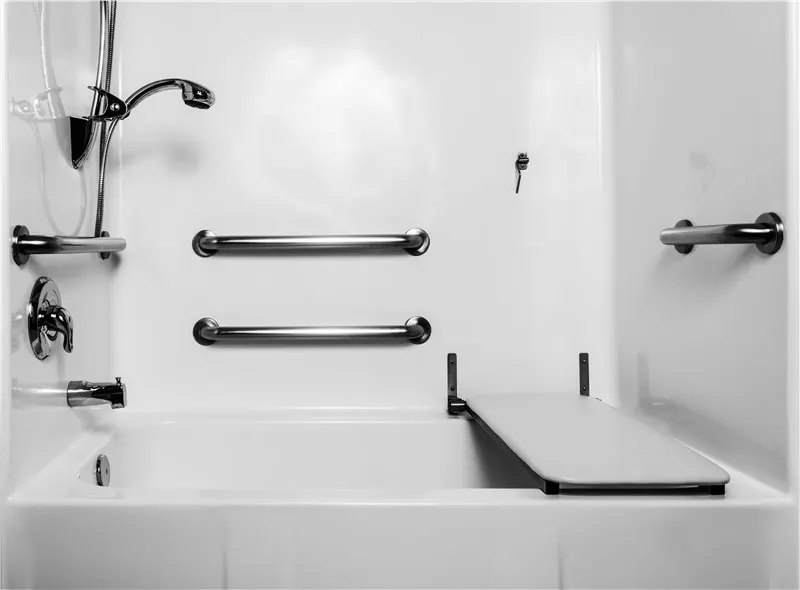 Tub and shower with dual black grab bars and fold down bench
