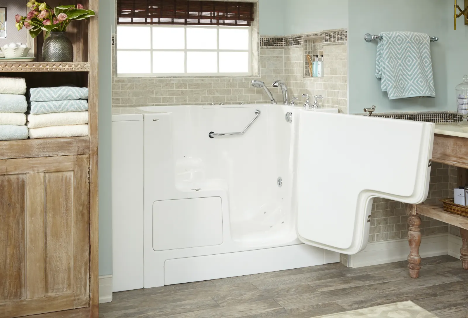 Walk in tub with grab bar, wood vanity